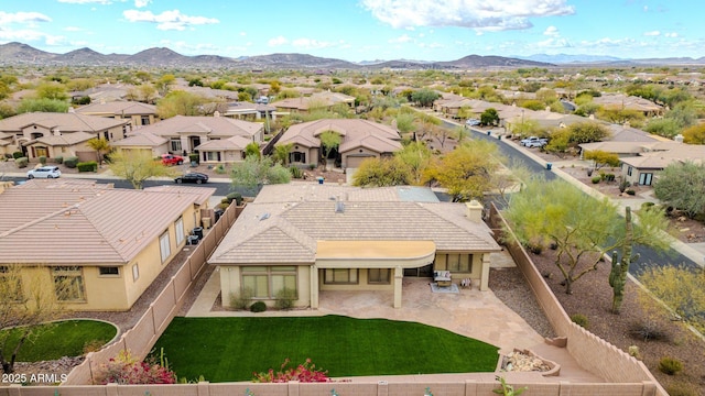 bird's eye view featuring a residential view and a mountain view