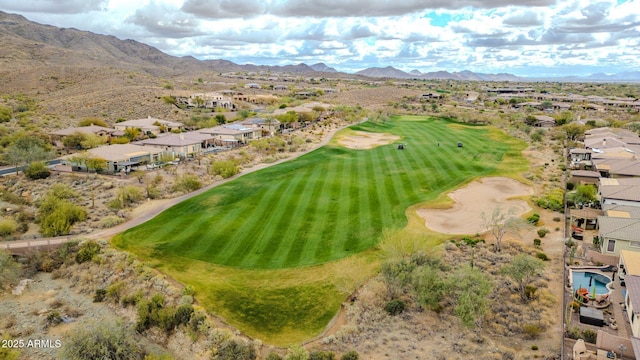 drone / aerial view featuring a residential view and a mountain view