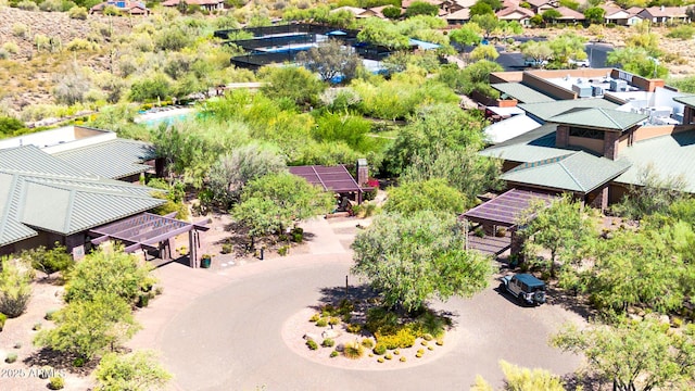 birds eye view of property with a residential view