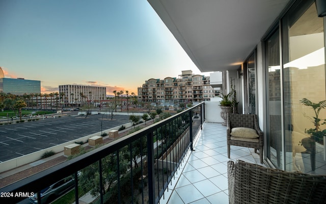 view of balcony at dusk