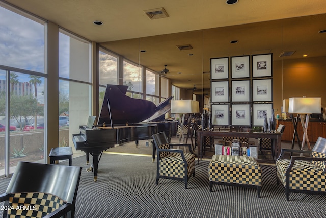 interior space featuring expansive windows and a healthy amount of sunlight