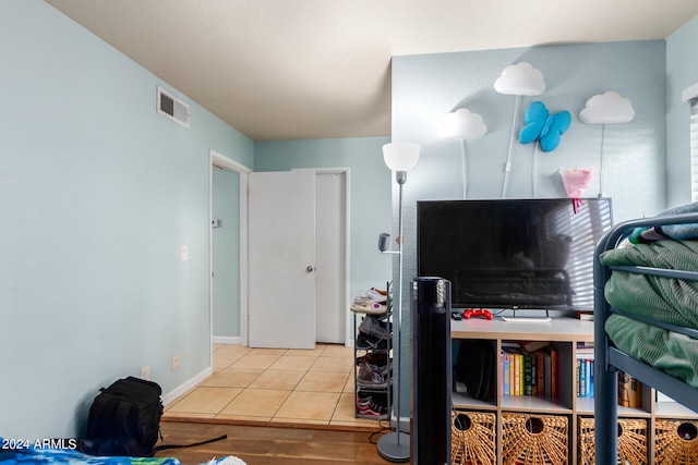 bedroom featuring hardwood / wood-style flooring