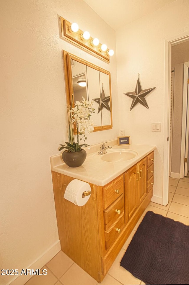 4905 E Horseshoe Ln, Cottonwood, AZ 86326 - bathroom with tile patterned flooring, vanity, and baseboards