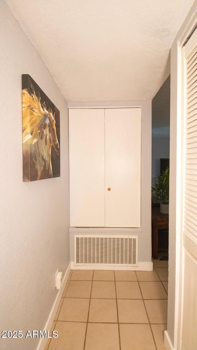4905 E Horseshoe Ln, Cottonwood, AZ 86326 - corridor with visible vents, tile patterned flooring, and baseboards