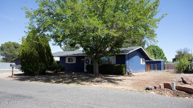 4905 E Horseshoe Ln, Cottonwood, AZ 86326 - ranch-style house featuring fence, a storage shed, and an outdoor structure