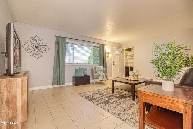 4905 E Horseshoe Ln, Cottonwood, AZ 86326 - tiled living room with baseboards and a textured ceiling