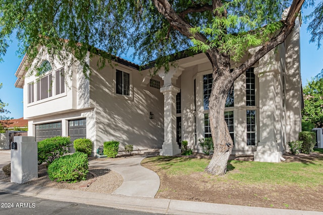 view of front of property with a garage