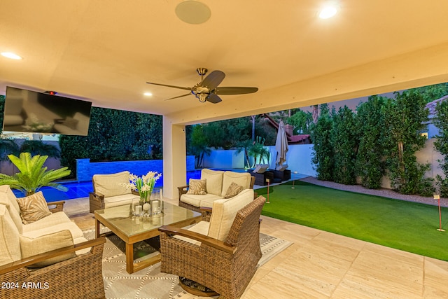 view of patio featuring ceiling fan and outdoor lounge area