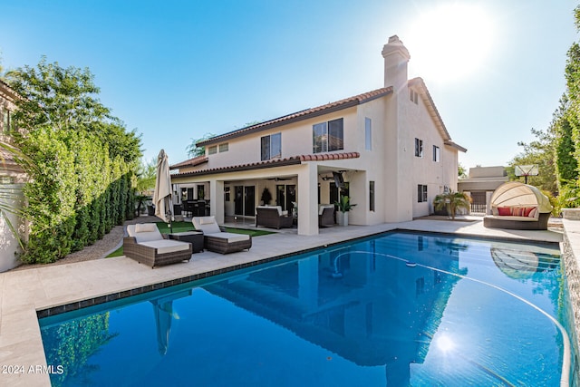 view of pool featuring an outdoor hangout area and a patio area