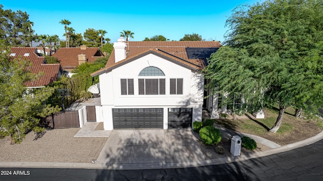 view of front of property featuring a garage