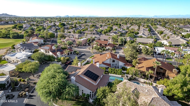 birds eye view of property featuring a mountain view