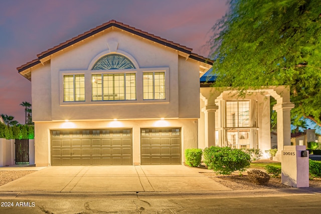 view of front of home featuring a garage