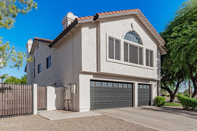 view of home's exterior with a garage