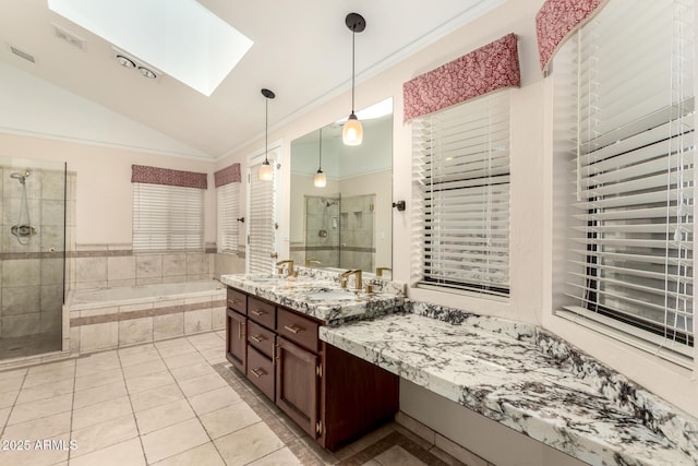 15602 N 19th St, Phoenix, AZ 85022 - bathroom with shower with separate bathtub, vanity, ornamental molding, tile patterned flooring, and lofted ceiling with skylight