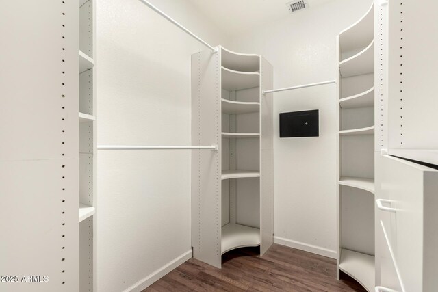 15602 N 19th St, Phoenix, AZ 85022 - spacious closet with dark wood-type flooring