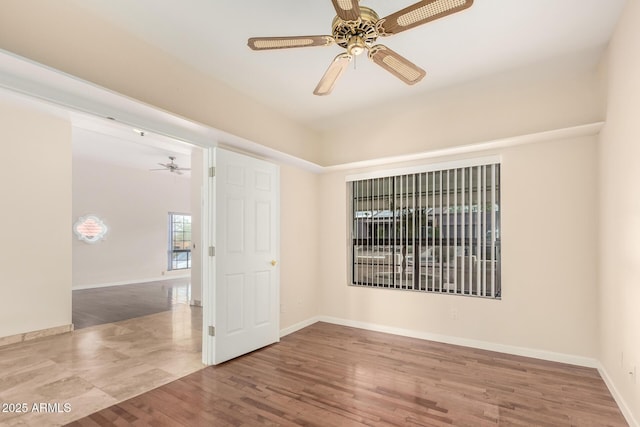 15602 N 19th St, Phoenix, AZ 85022 - empty room featuring ceiling fan and wood-type flooring