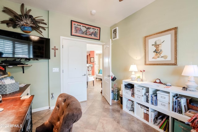 hall featuring light tile patterned floors