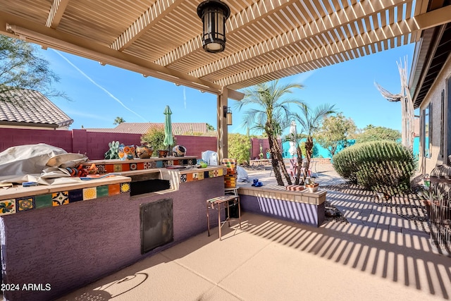 view of patio / terrace with a pergola