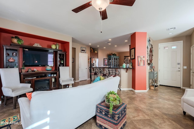 living room with ceiling fan