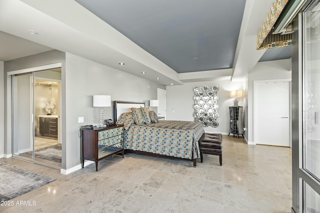 bedroom featuring recessed lighting and baseboards