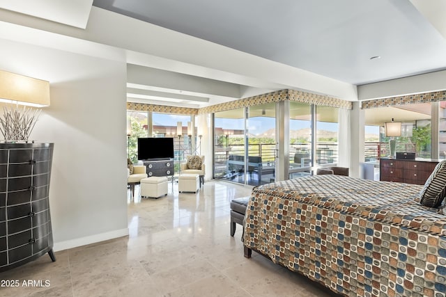bedroom featuring light tile patterned flooring, baseboards, and access to exterior