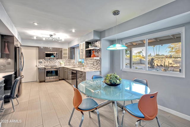 dining room featuring sink