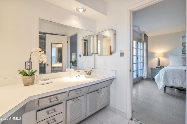 bathroom featuring tile patterned floors and vanity