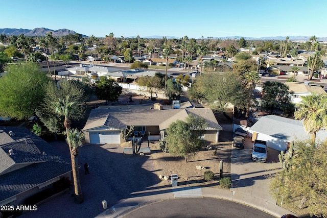 drone / aerial view featuring a mountain view