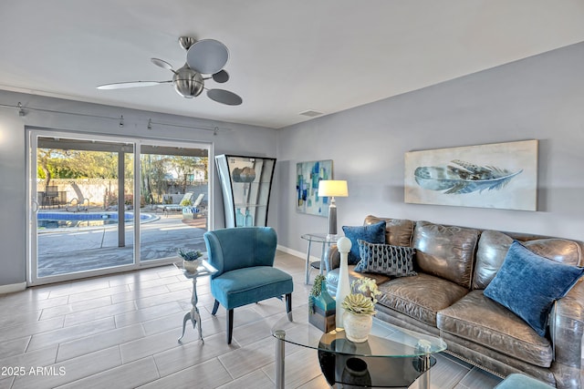 living room featuring ceiling fan