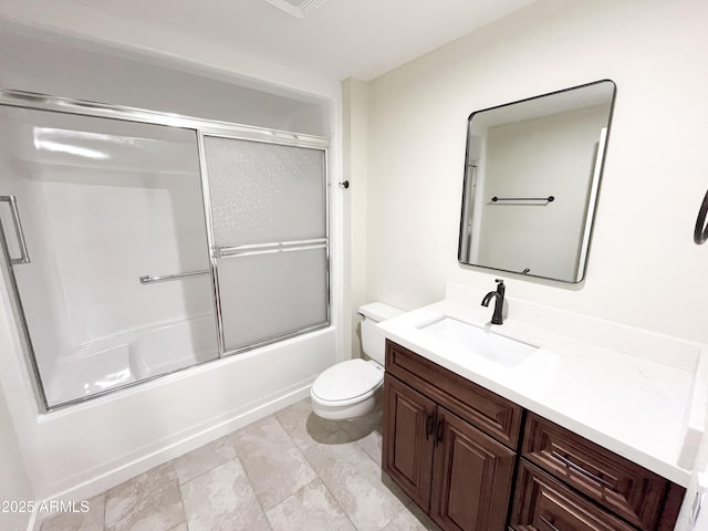 full bathroom with bath / shower combo with glass door, toilet, and vanity