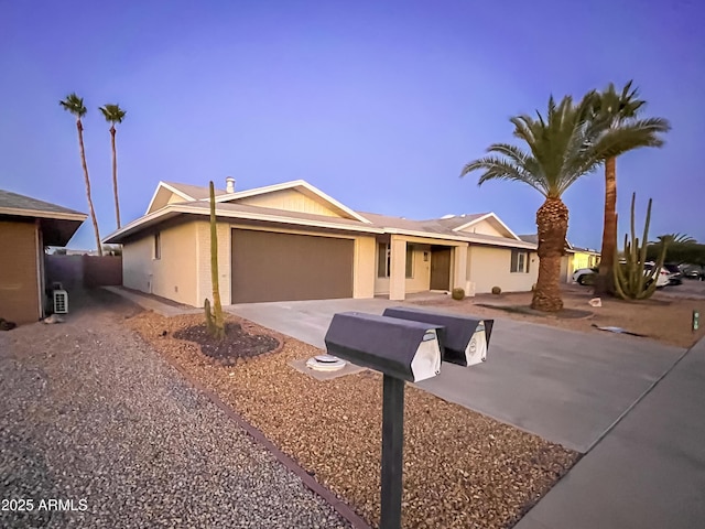 ranch-style home with a garage