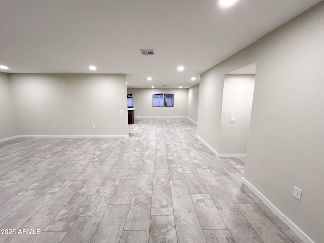 basement featuring light hardwood / wood-style floors