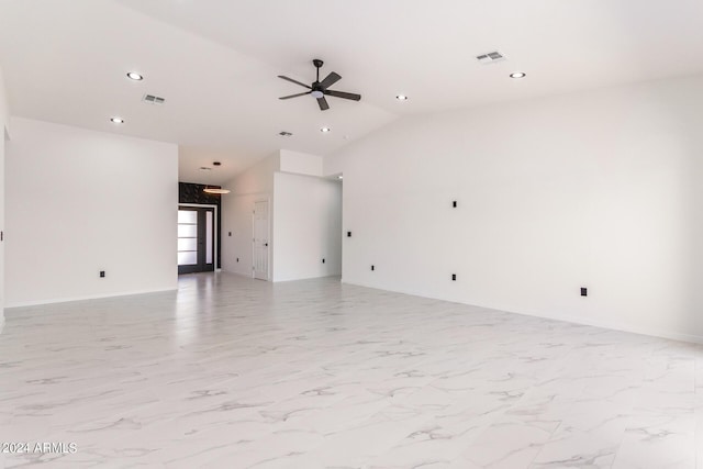 empty room with marble finish floor, lofted ceiling, recessed lighting, visible vents, and a ceiling fan