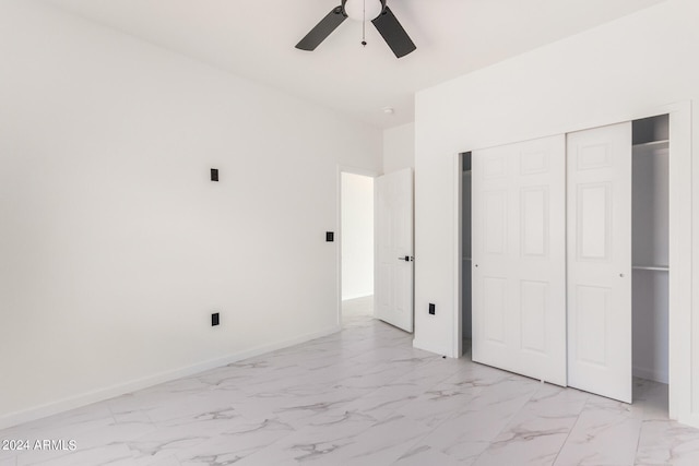 unfurnished bedroom with ceiling fan, light tile patterned floors, and a closet