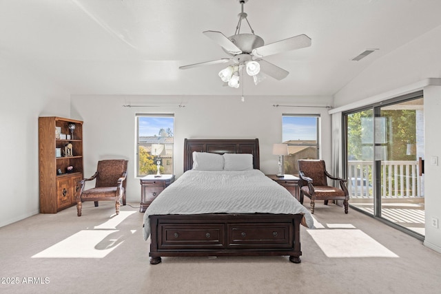 carpeted bedroom with vaulted ceiling, access to outside, and ceiling fan