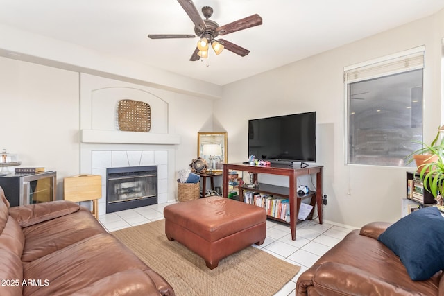 1451 E S Fork Dr, Phoenix, AZ 85048 - living area featuring tile patterned floors, a ceiling fan, and a tiled fireplace