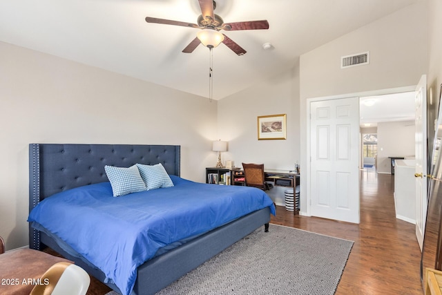 1451 E S Fork Dr, Phoenix, AZ 85048 - bedroom with lofted ceiling, wood finished floors, ceiling fan, and baseboards