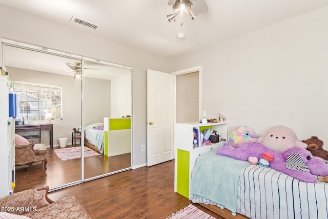 1451 E S Fork Dr, Phoenix, AZ 85048 - bedroom featuring a closet, wood finished floors, and baseboards