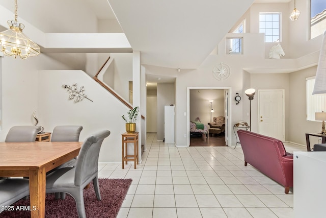 1451 E S Fork Dr, Phoenix, AZ 85048 - dining room with high vaulted ceiling, light tile patterned flooring, and a chandelier