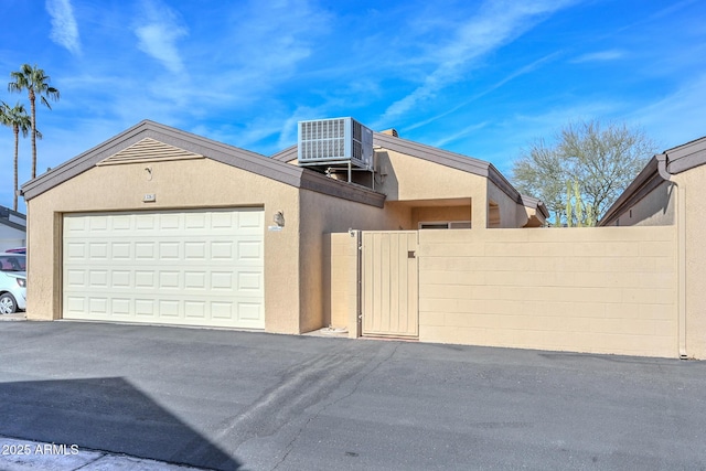 garage featuring central AC unit