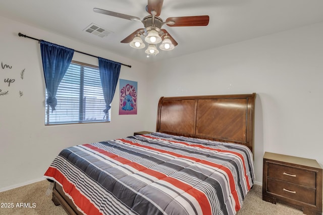 bedroom with carpet, baseboards, ceiling fan, and visible vents