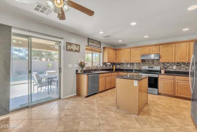 kitchen featuring visible vents, ceiling fan, appliances with stainless steel finishes, under cabinet range hood, and a sink