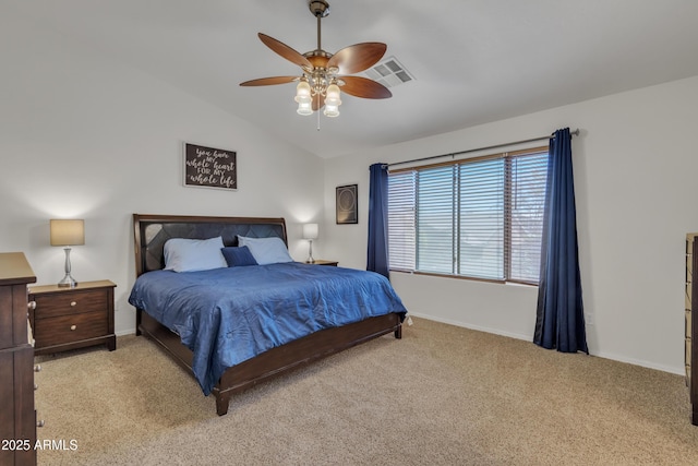 bedroom featuring light colored carpet, lofted ceiling, visible vents, and baseboards