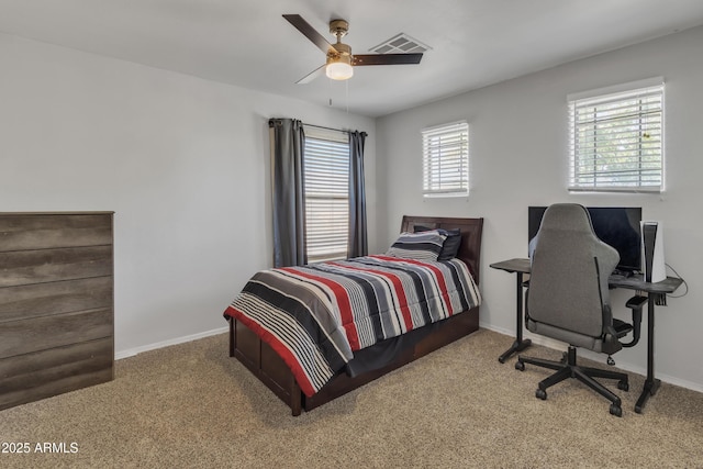 bedroom with baseboards, visible vents, and carpet floors