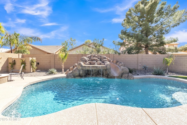 view of swimming pool with a fenced backyard and a fenced in pool
