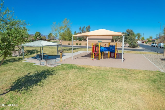 community playground featuring a yard