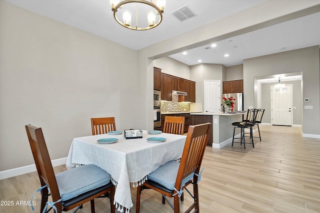 32128 S Bighorn Dr, Oracle, AZ 85623 - dining room with a chandelier, light wood-type flooring, and recessed lighting
