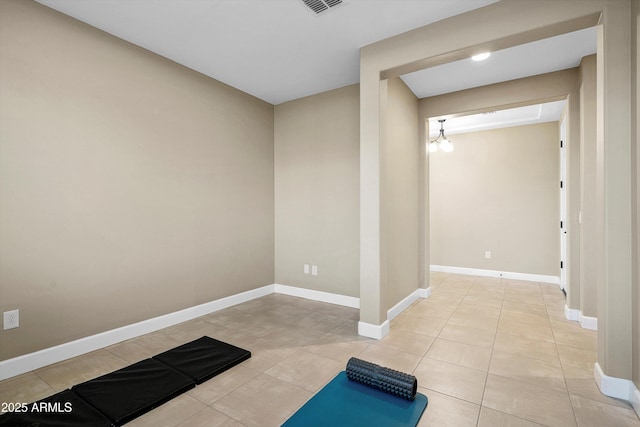 32128 S Bighorn Dr, Oracle, AZ 85623 - workout area with light tile patterned flooring and baseboards