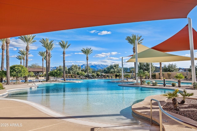 32128 S Bighorn Dr, Oracle, AZ 85623 - community pool featuring a mountain view and a patio area
