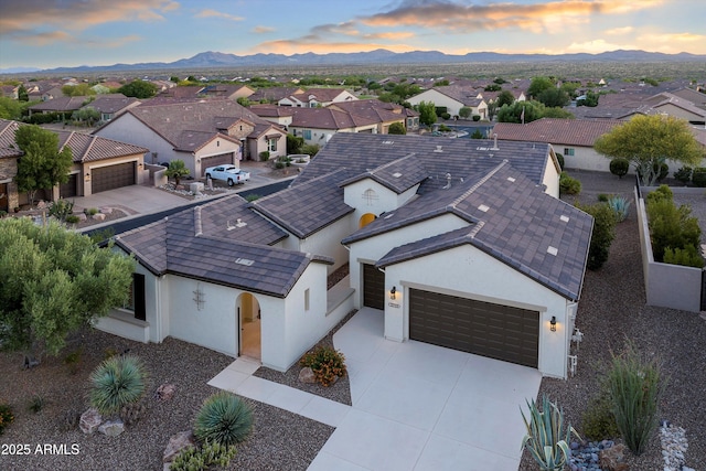 32128 S Bighorn Dr, Oracle, AZ 85623 - aerial view at dusk of a residential view and a mountain view